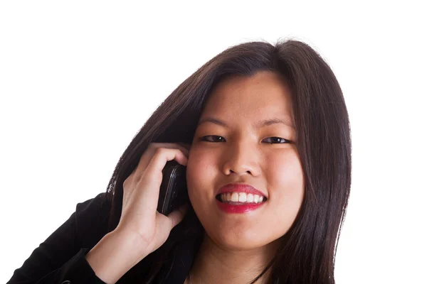 Молодая китаянка разговаривает по мобильному телефону — стоковое фото