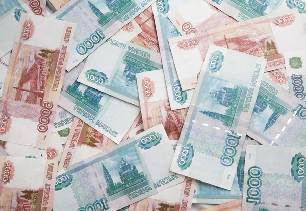 Background of one and five thousand russian roubles bills — Stock Photo, Image