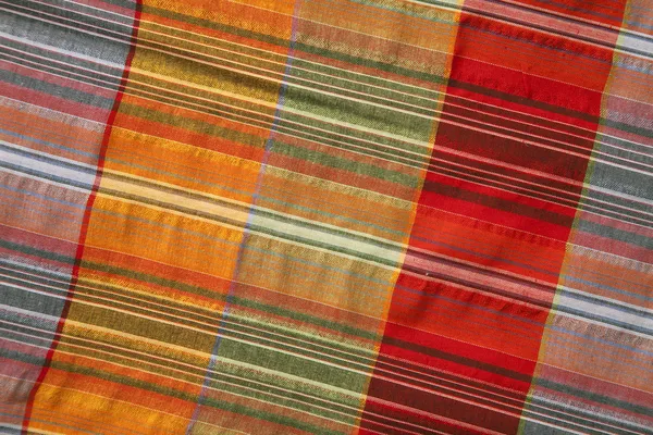 Tecido multicolorido com padrão geométrico — Fotografia de Stock