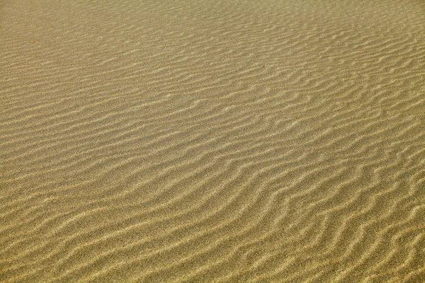 Golfde zand — Stockfoto
