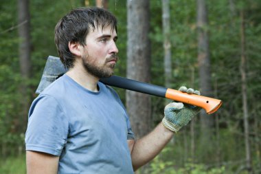 Lumberman with an axe clipart