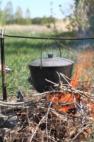 Cauldron on picnic — Stock Photo, Image