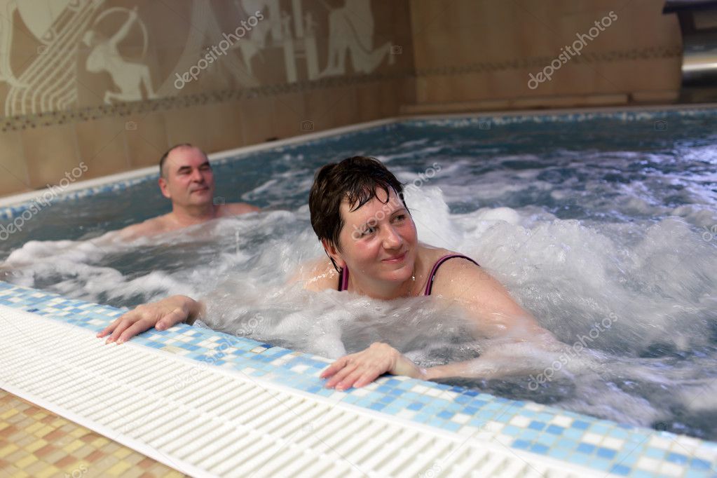 Woman resting in jacuzzi