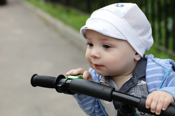 Curious child on bicycle — Stock Photo, Image