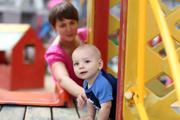 Baby on slide — Stock Photo, Image