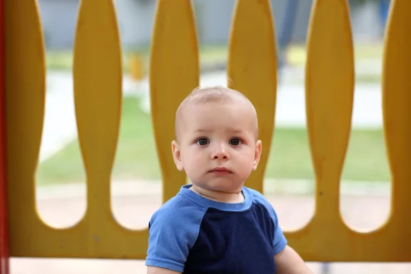 Serious child at playground — Stock Photo, Image