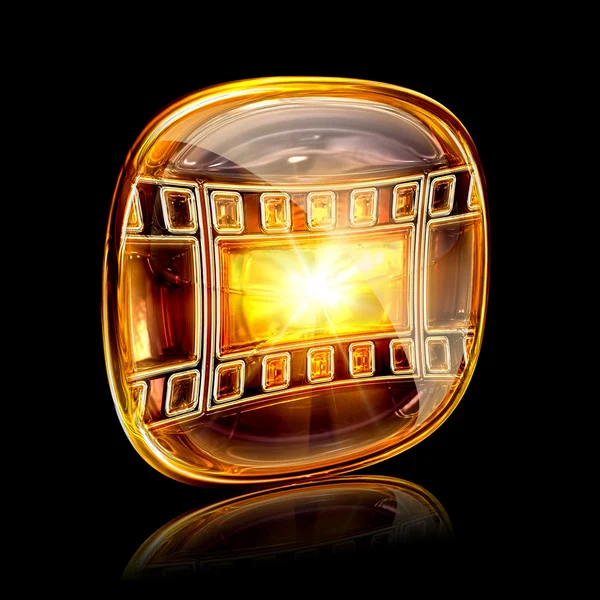 Film icon amber, isolated on black background — Stock Photo, Image