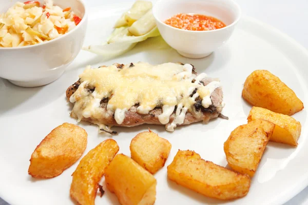 Schnitzel with potatoes — Stock Photo, Image