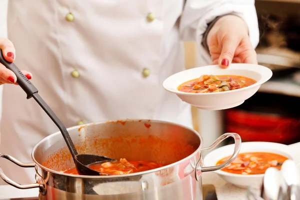 stock image Chef cooking solyanka in kitchen