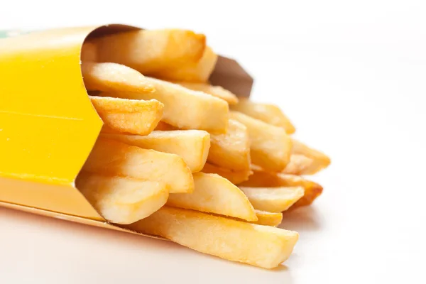 French fries on a white background — Stock Photo, Image