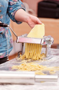 Chef making pasta clipart