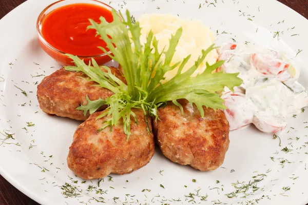 Cutlets with potatoes — Stock Photo, Image
