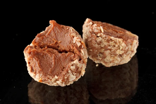 Chocolate truffle with nuts — Stock Photo, Image
