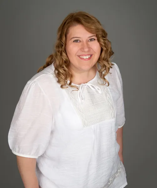 Happy fat woman on gray background — Stock Photo, Image