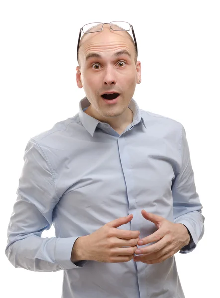 Young man with a shocked facial expression — Stock Photo, Image