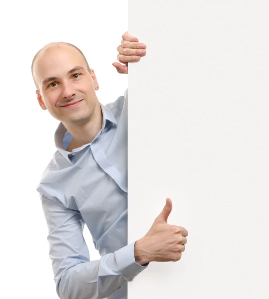 Homem com banner em branco mostrando polegares para cima gesto — Fotografia de Stock