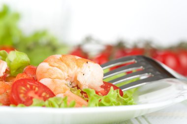 Salad of king prawns clipart