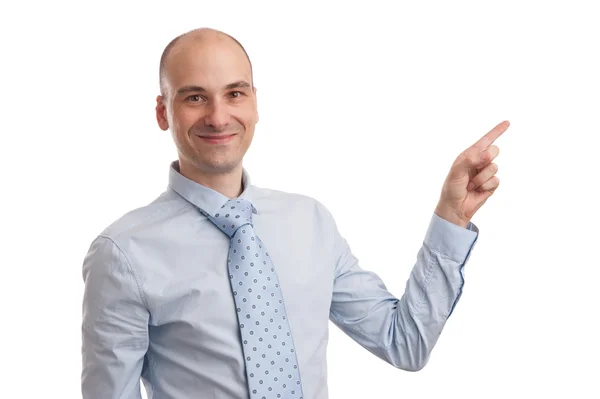 Young business man pointing at something — Stock Photo, Image