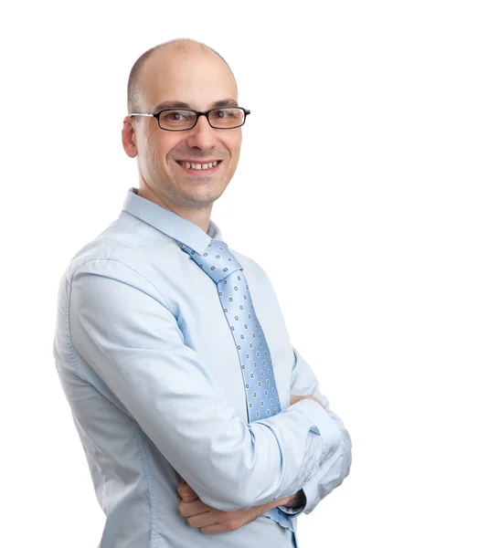 Hombre de negocios sonriente con gafas y brazos cruzados — Foto de Stock