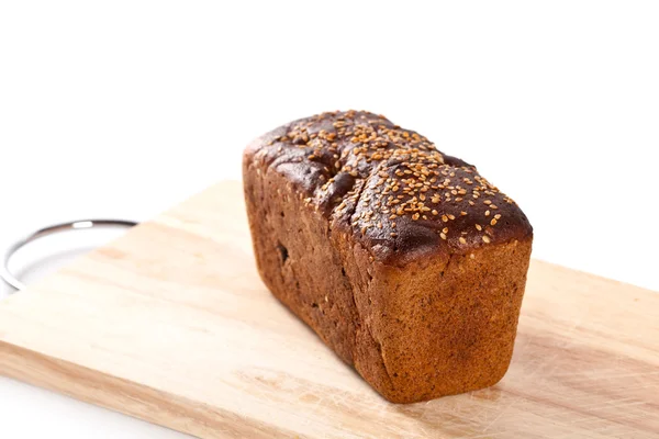 Brood op de houten plank — Stockfoto