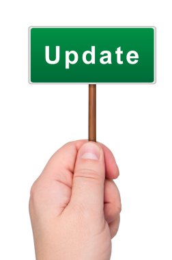 Update a road sign in hand. clipart