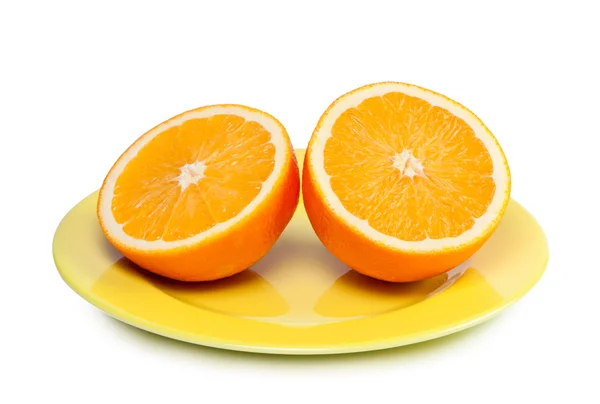 Оранжевый на тарелке . — стоковое фото