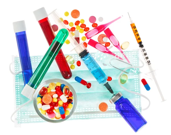Medical concept with pills, ampoules and syringes isolated on wh — Stock Photo, Image
