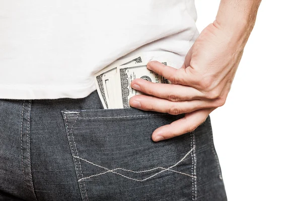 Moeda de dólar no bolso de jeans — Fotografia de Stock