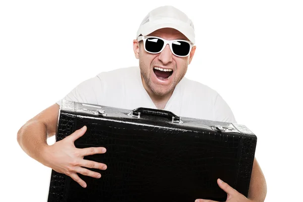 Man holding suitcase in hands — Stock Photo, Image