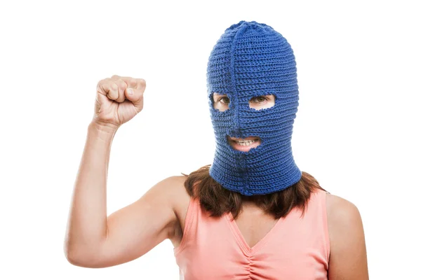 Woman in balaclava showing raised fist gesture — Stock Photo, Image