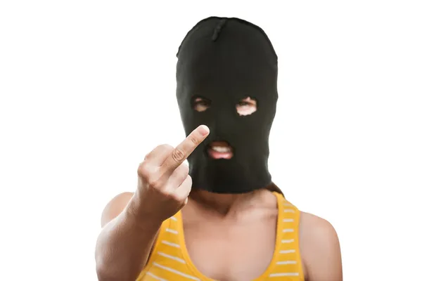 Woman in balaclava showing middle finger hand gesture — Stock Photo, Image
