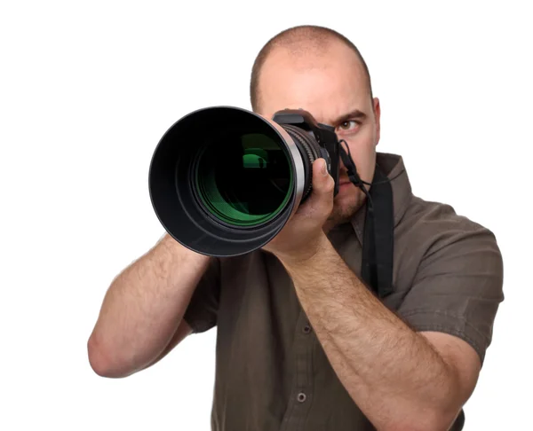 Muž drží fotoaparát — Stock fotografie