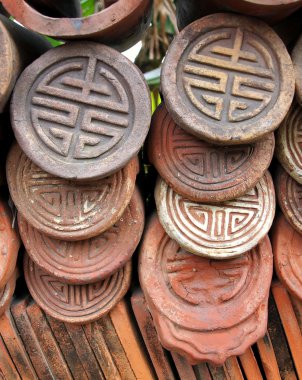 Decorated Traditional Chinese Roof Tiles clipart