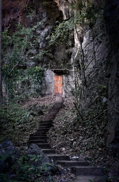 Door into the dark mountain — Stock Photo, Image