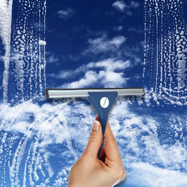 Window with blue sky and white clouds — Stock Photo, Image