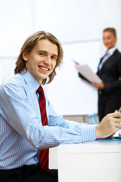 Young businessman at work in office — Stock Photo, Image