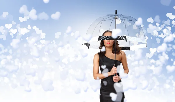 Mulher bonita com guarda-chuva e corações — Fotografia de Stock