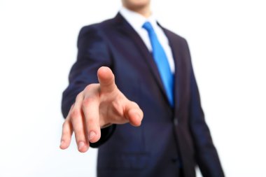 Businessman pushing a button with his finger clipart