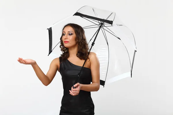 Portrait of young woman with umbrella — Stock Photo, Image