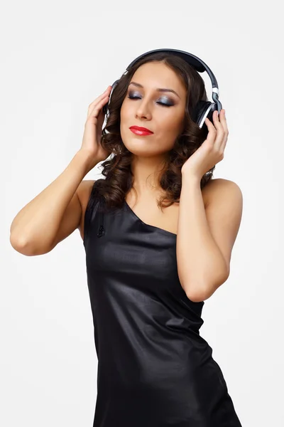 Portrait of young woman with headphones Royalty Free Stock Photos