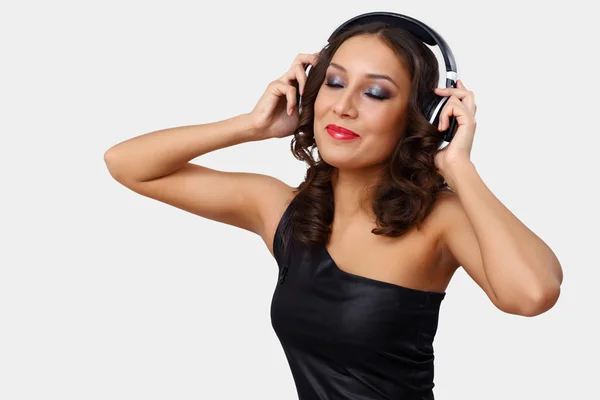 Portrait of young woman with headphones Stock Image