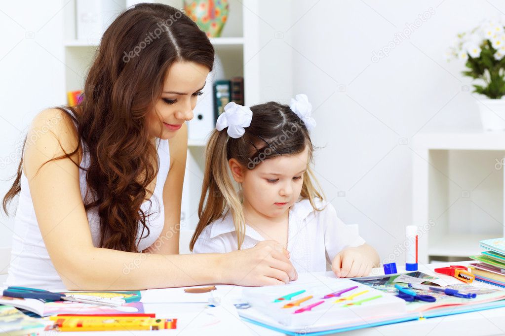 Mother and daughter studying