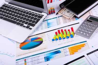 finansal kağıtları masaya