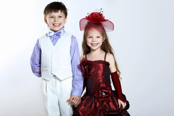 Bambina in bel vestito e ragazzo — Foto Stock