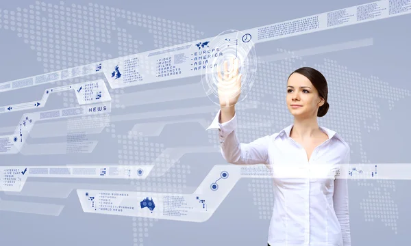 Businesswoman and touch screen technology — Stock Photo, Image