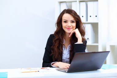 Young busines woman with notebook clipart