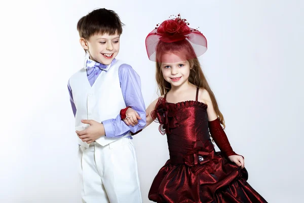 Malá holčička v krásné šaty a boy — Stock fotografie