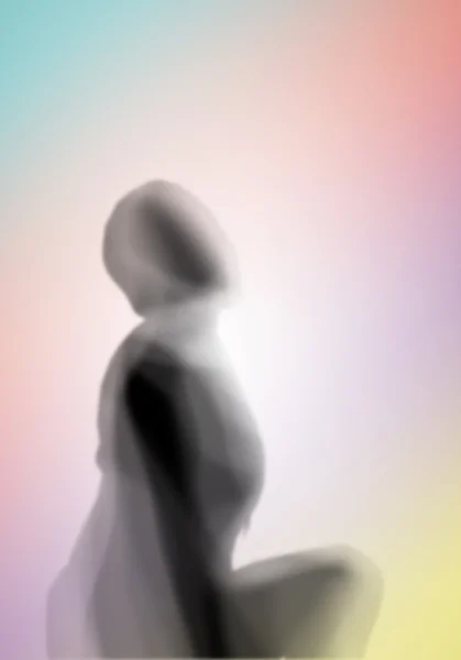 Weibliche Silhouette vor farbigem Hintergrund — Stockfoto