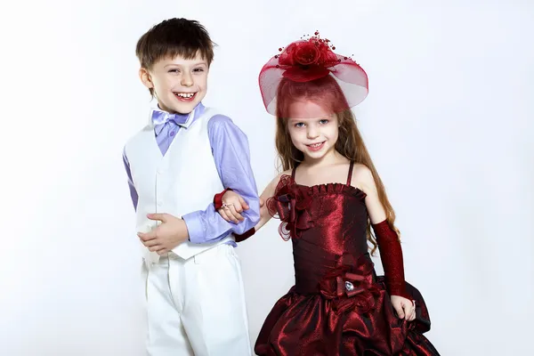 Menina em vestido bonito e menino — Fotografia de Stock