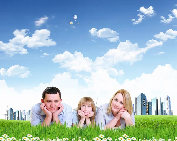 Young happy family outdoor — Stock Photo, Image